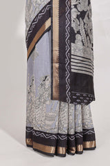 Indigo Blue colour viscose georgette saree All-over elegant ethnic detailing gold zari border and Statement pallu with artistic motifs with contrast printed blouse