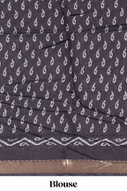 Indigo Blue colour viscose georgette saree All-over elegant ethnic detailing gold zari border and Statement pallu with artistic motifs with contrast printed blouse