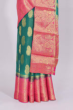 Green zari motifs viscose georgette saree with contrast zari border and blouse