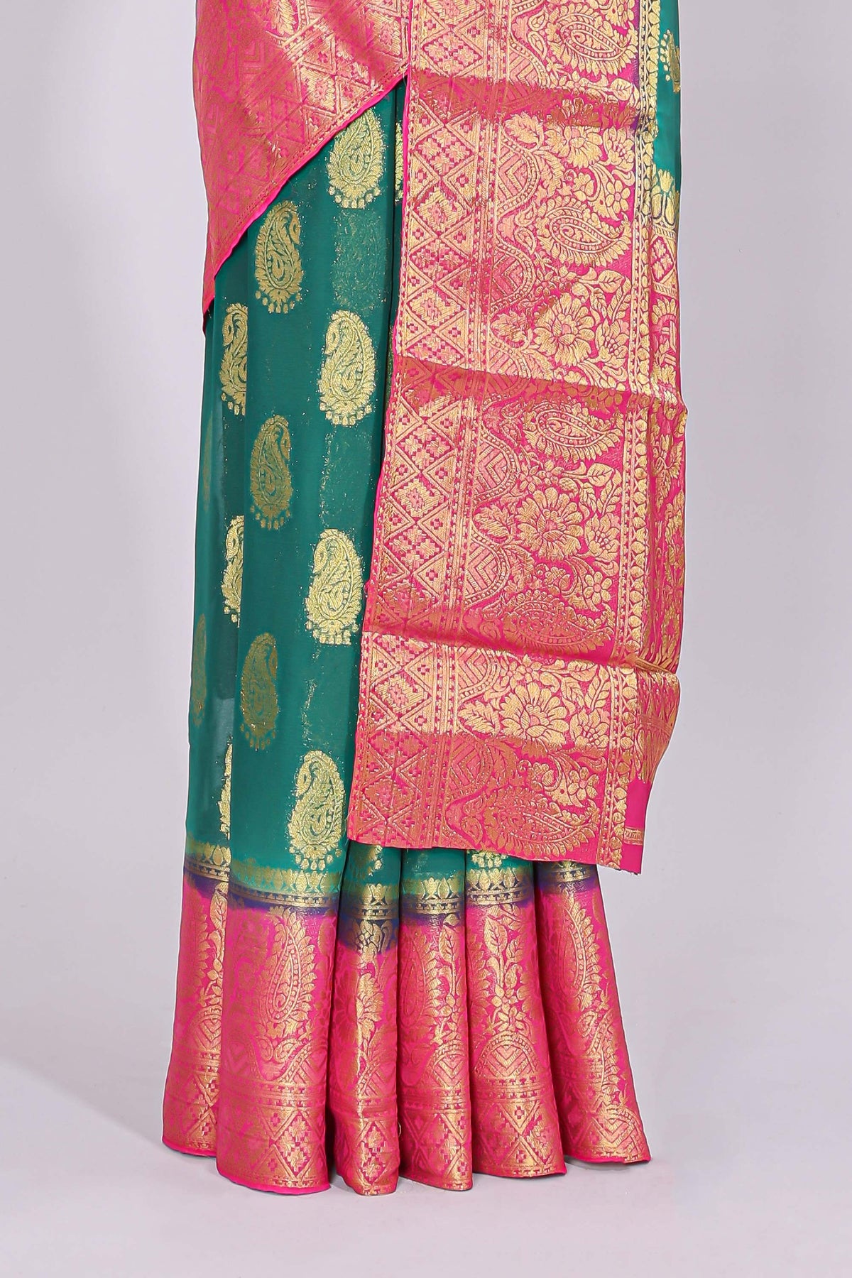 Green zari motifs viscose georgette saree with contrast zari border and blouse