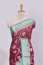 Purple floral zari motifs viscose georgette saree with contrast zari border and blouse