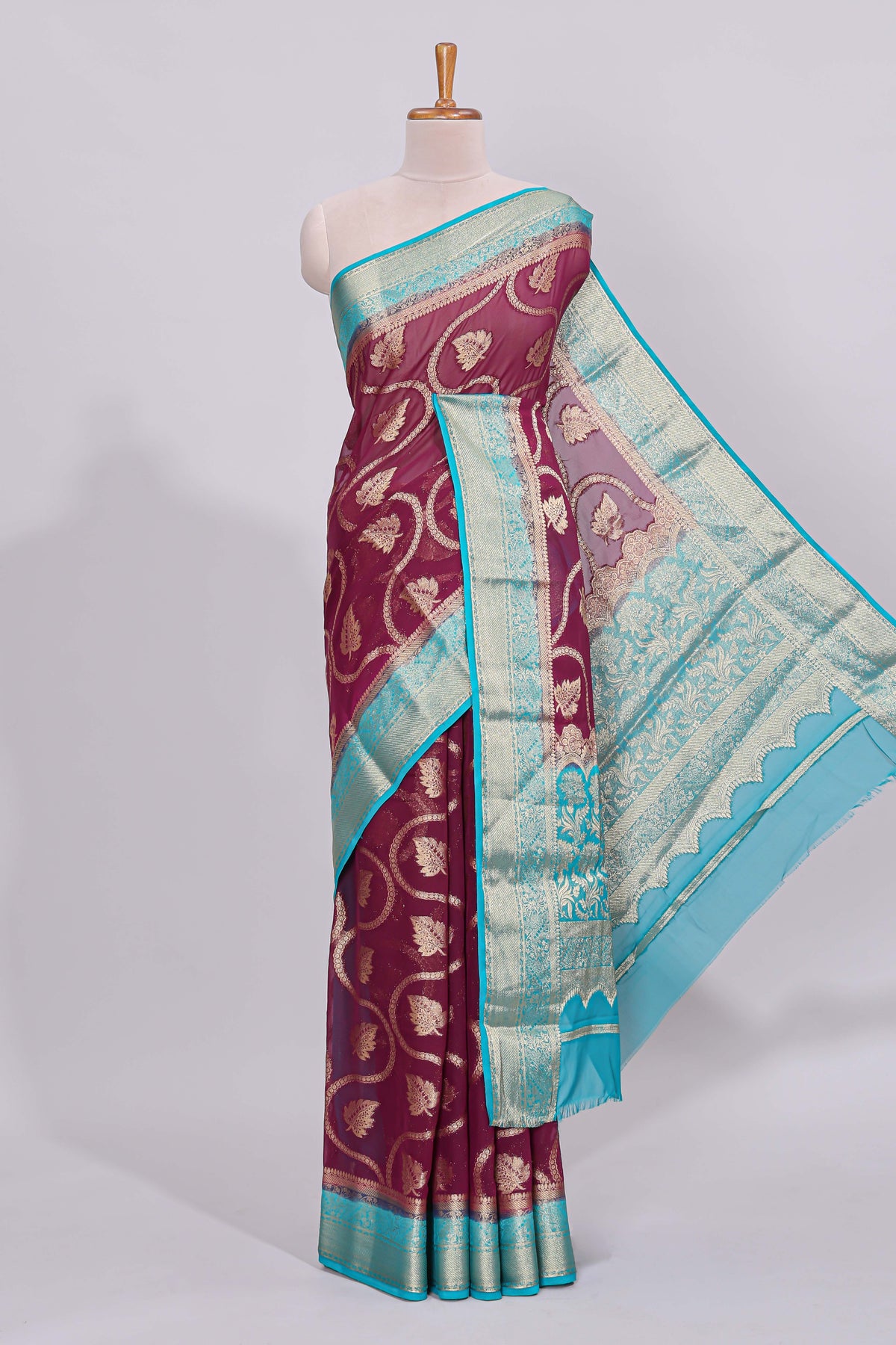 Purple floral zari motifs viscose georgette saree with contrast zari border and blouse