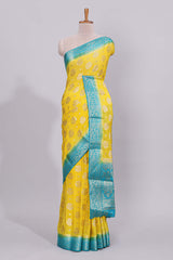 Yellow floral zari motifs viscose georgette saree with contrast zari border and blouse