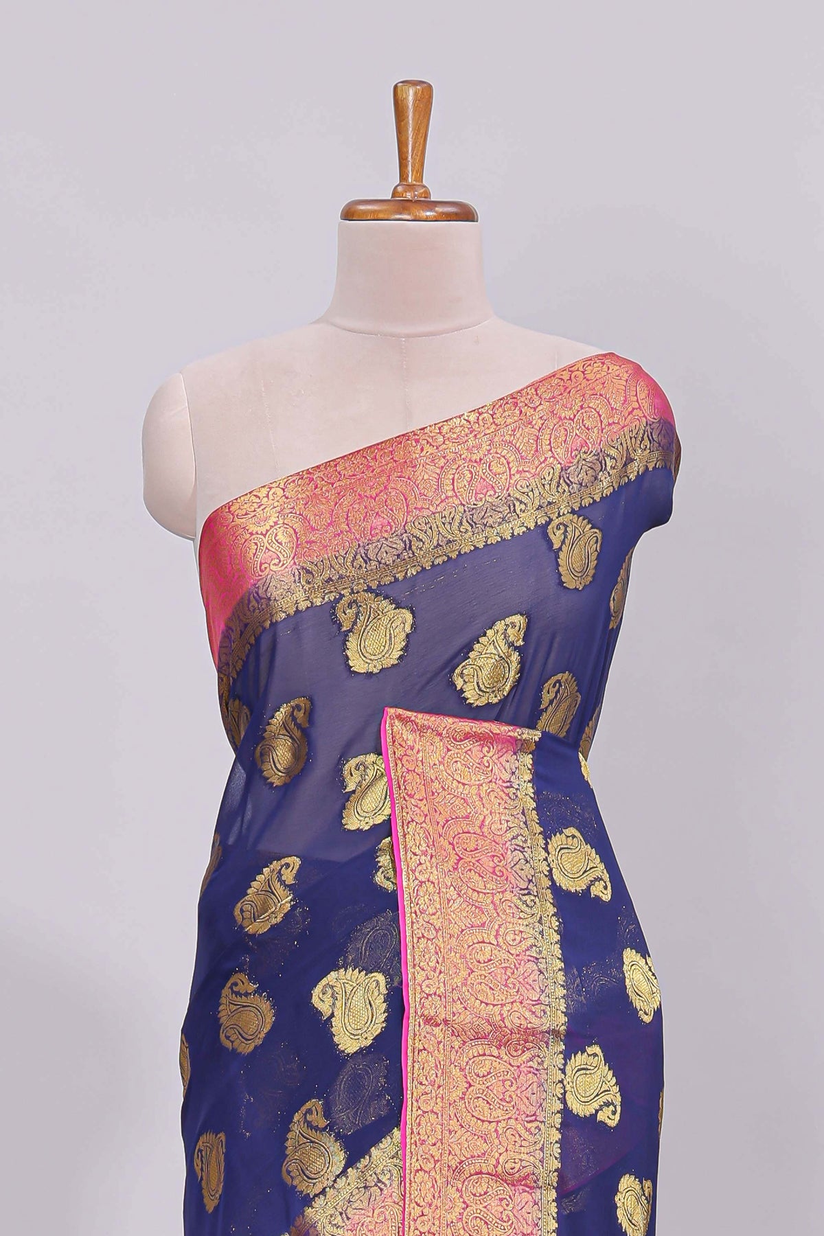 Blue floral zari motifs viscose georgette saree with contrast zari border and blouse