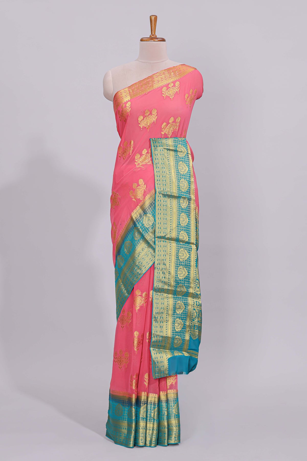 Pink floral zari motifs viscose georgette saree with contrast checked zari border and blouse