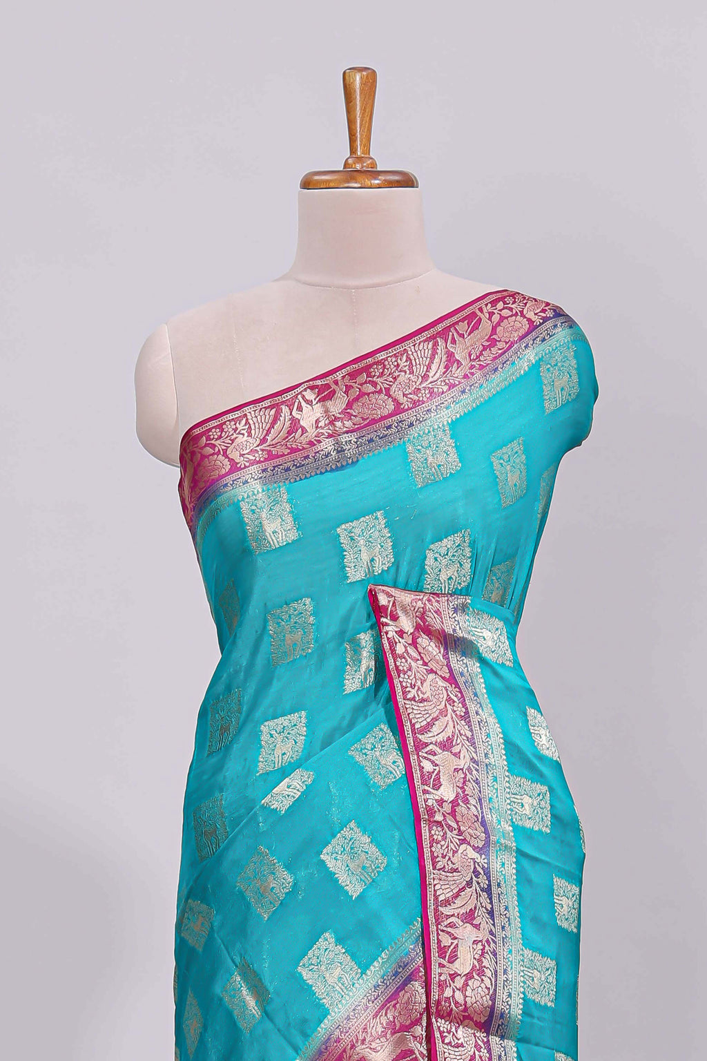 Steel blue square floral deer motifs viscose georgette saree with contrast checked zari border and blouse