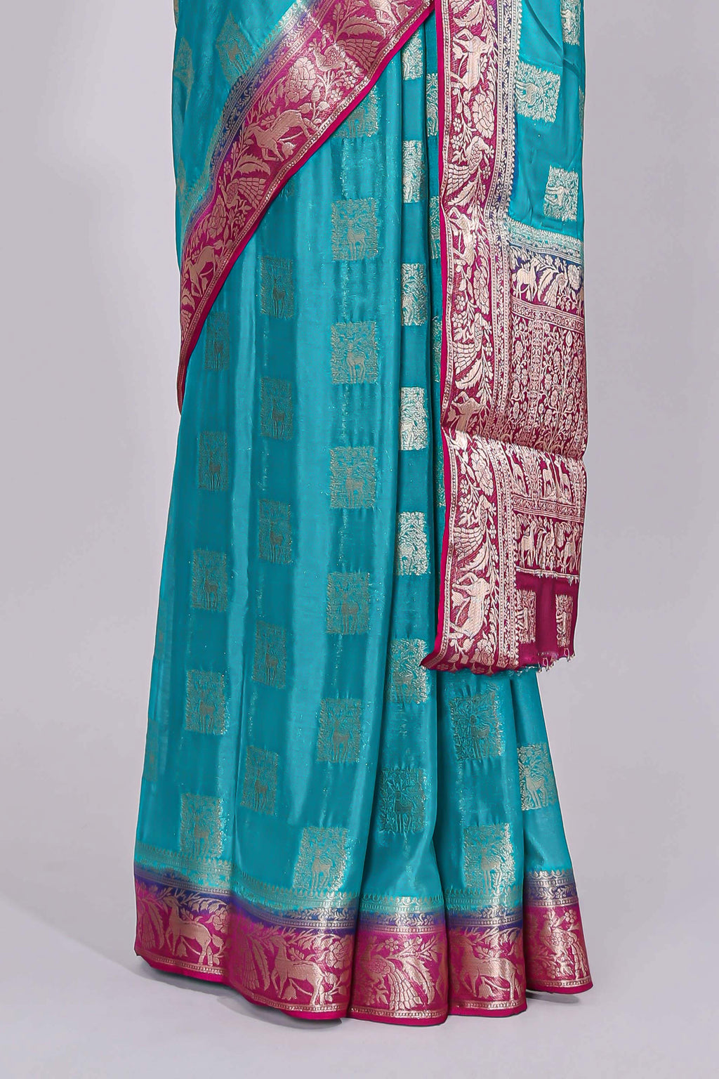 Steel blue square floral deer motifs viscose georgette saree with contrast checked zari border and blouse