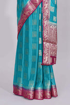Steel blue square floral deer motifs viscose georgette saree with contrast checked zari border and blouse