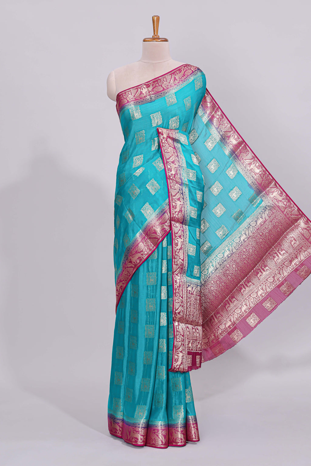 Steel blue square floral deer motifs viscose georgette saree with contrast checked zari border and blouse