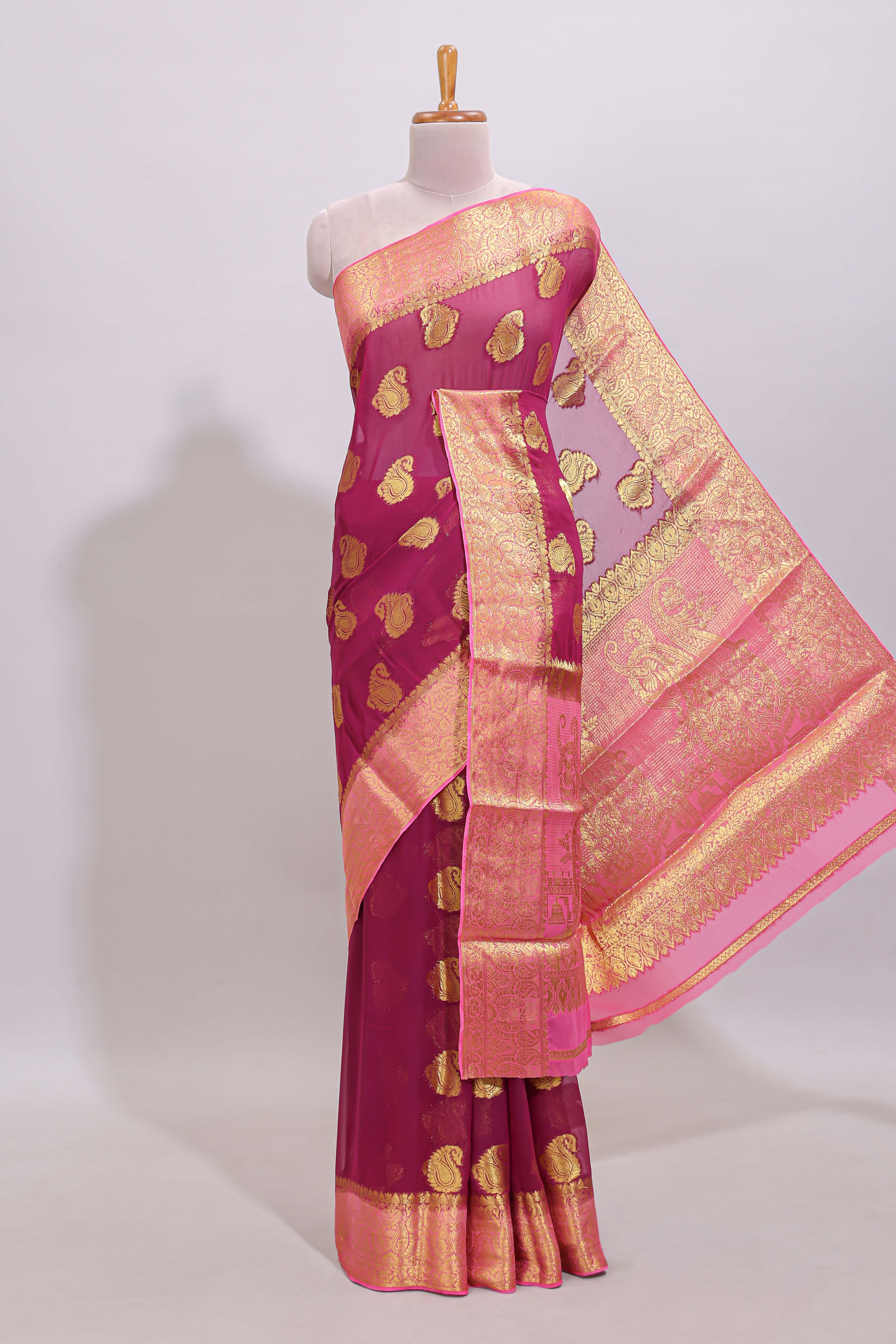 Wine pink paisley zari design viscose georgette saree with contrast zari border and blouse