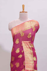Wine pink paisley zari design viscose georgette saree with contrast zari border and blouse
