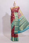 Maroon paisley zari design viscose georgette saree with contrast zari border and blouse