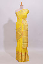 Bright yellow diagonal and vertical striped weave design viscose georgette saree with self zari border and blouse