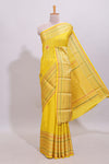 Bright yellow diagonal and vertical striped weave design viscose georgette saree with self zari border and blouse