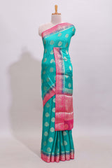 Teal Blue paisley zari butta design viscose georgette saree with Contrast zari border and blouse