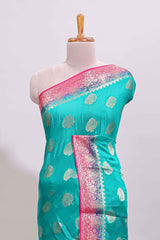 Teal Blue paisley zari butta design viscose georgette saree with Contrast zari border and blouse