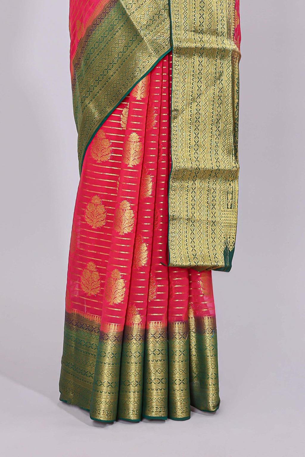 Pink striped floral motifs design viscose georgette saree with contrast checked zari border and blouse
