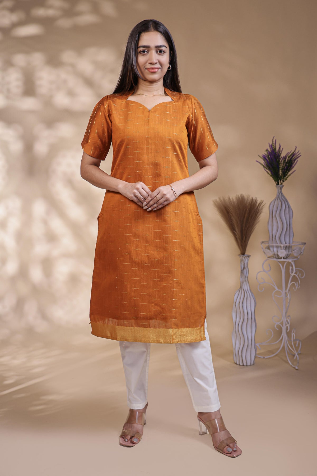 Orange Self-Textured motifs design Straight Kurti with Gold Border, Sweetheart Neck and 3/4 Sleeves