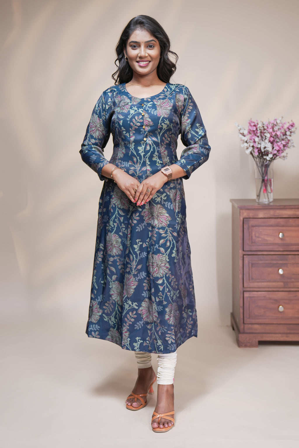 Teal blue straight anarkali kurti with floral design, round neck and 3/4 sleeves