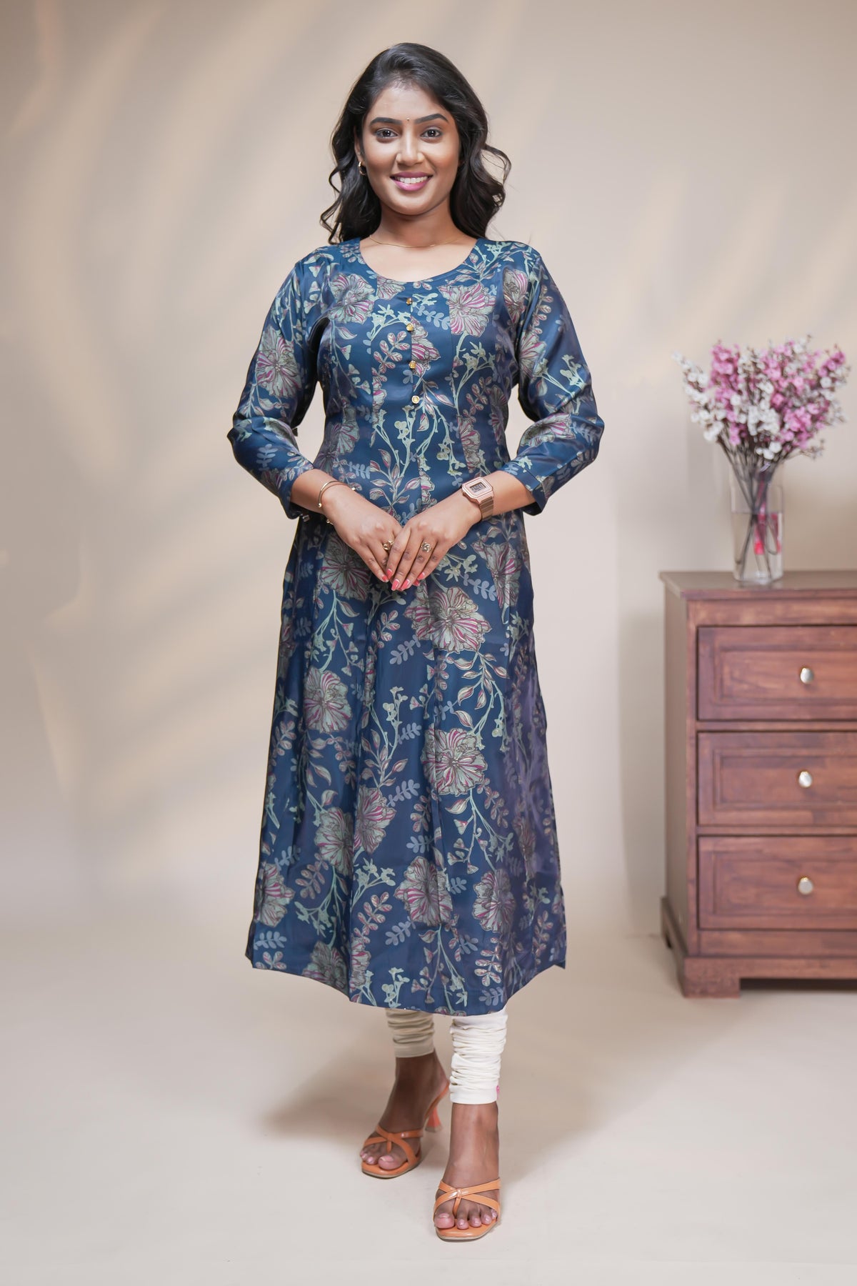Teal blue straight anarkali kurti with floral design, round neck and 3/4 sleeves