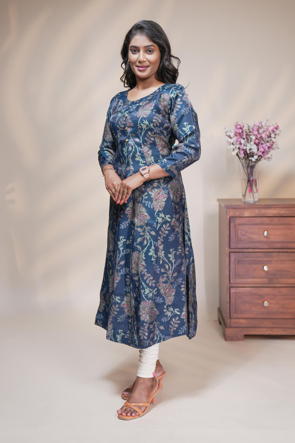 Teal blue straight anarkali kurti with floral design, round neck and 3/4 sleeves