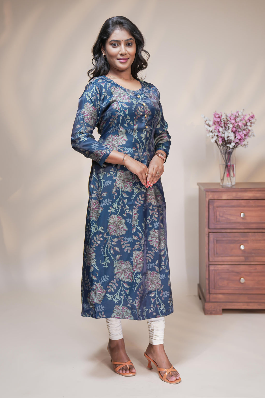 Teal blue straight anarkali kurti with floral design, round neck and 3/4 sleeves