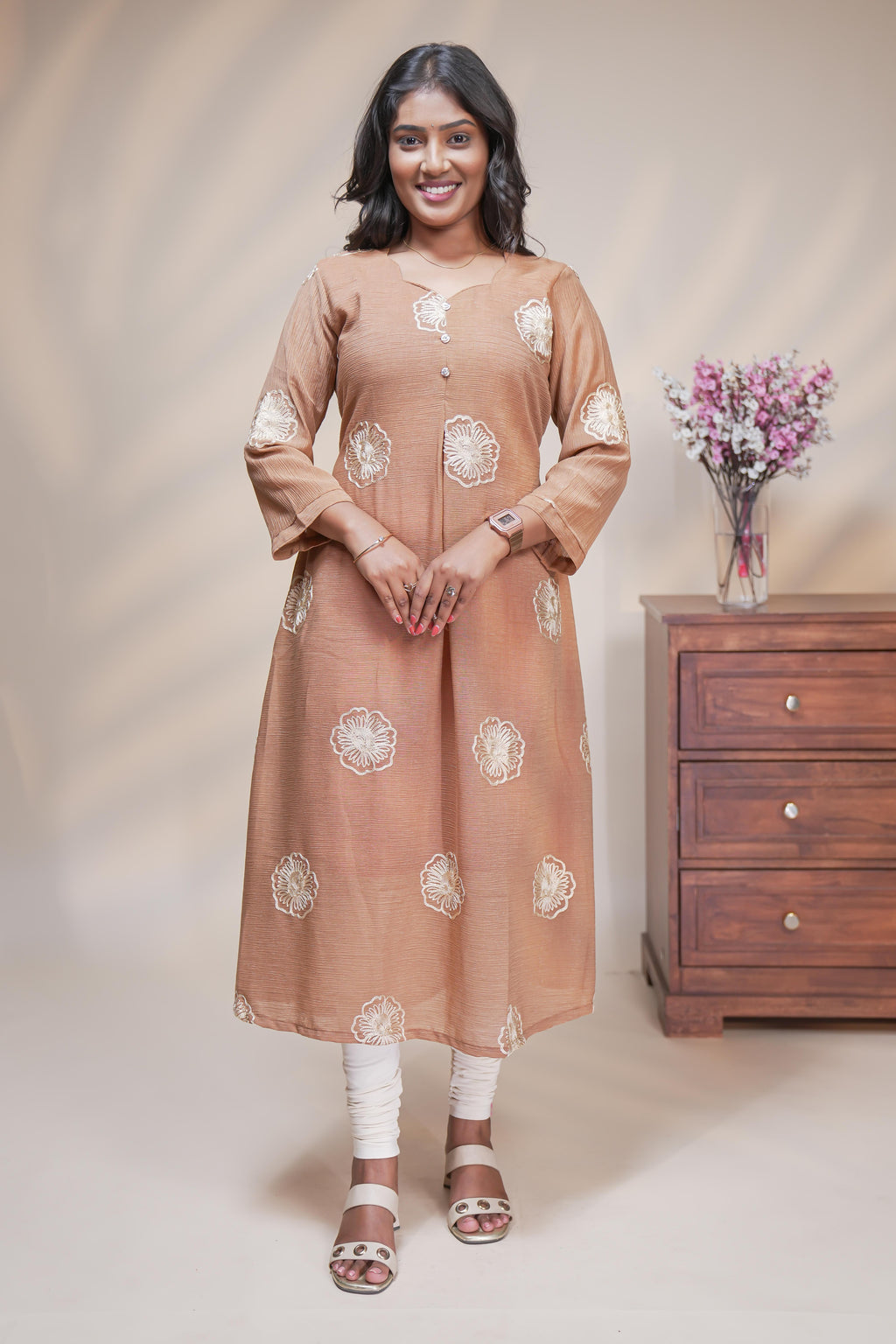 Beige straight anarkali kurti with floral design, round neck and 3/4 sleeves