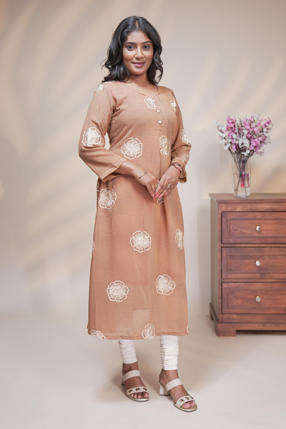 Beige straight anarkali kurti with floral design, round neck and 3/4 sleeves