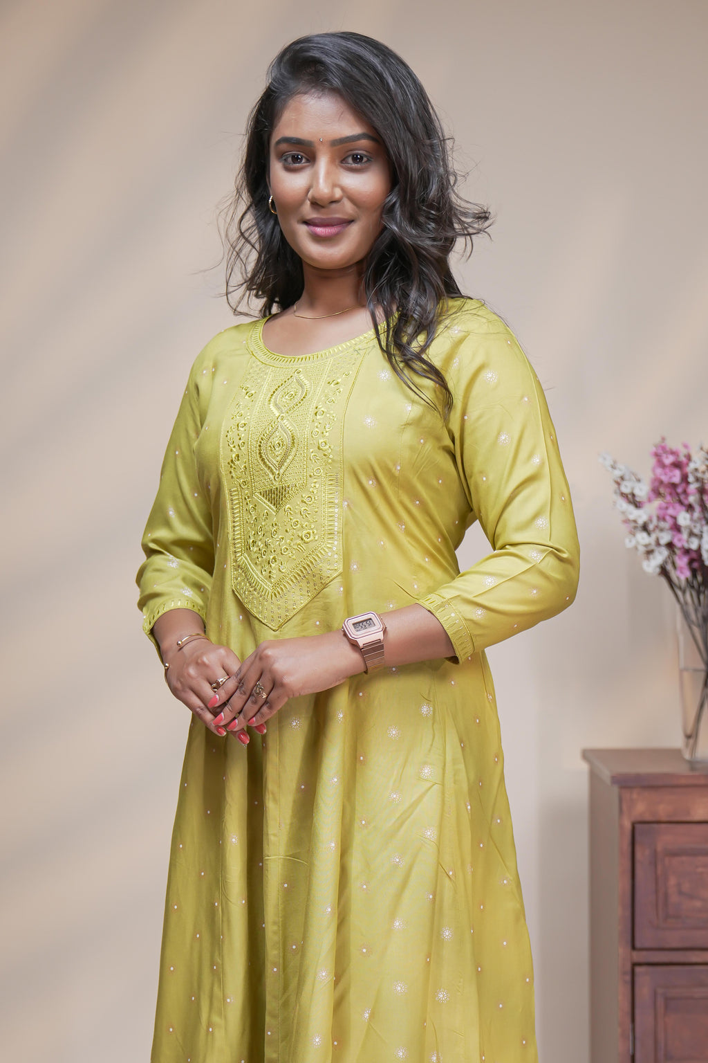 Lime green straight anarkali kurti with polka design, round neck and 3/4 sleeves