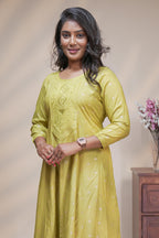 Lime green straight anarkali kurti with polka design, round neck and 3/4 sleeves