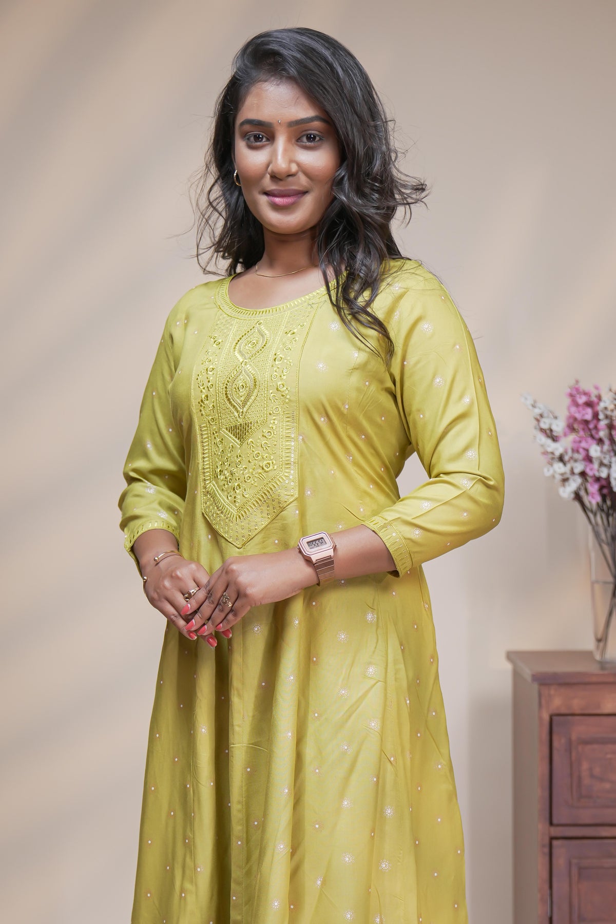 Lime green straight anarkali kurti with polka design, round neck and 3/4 sleeves