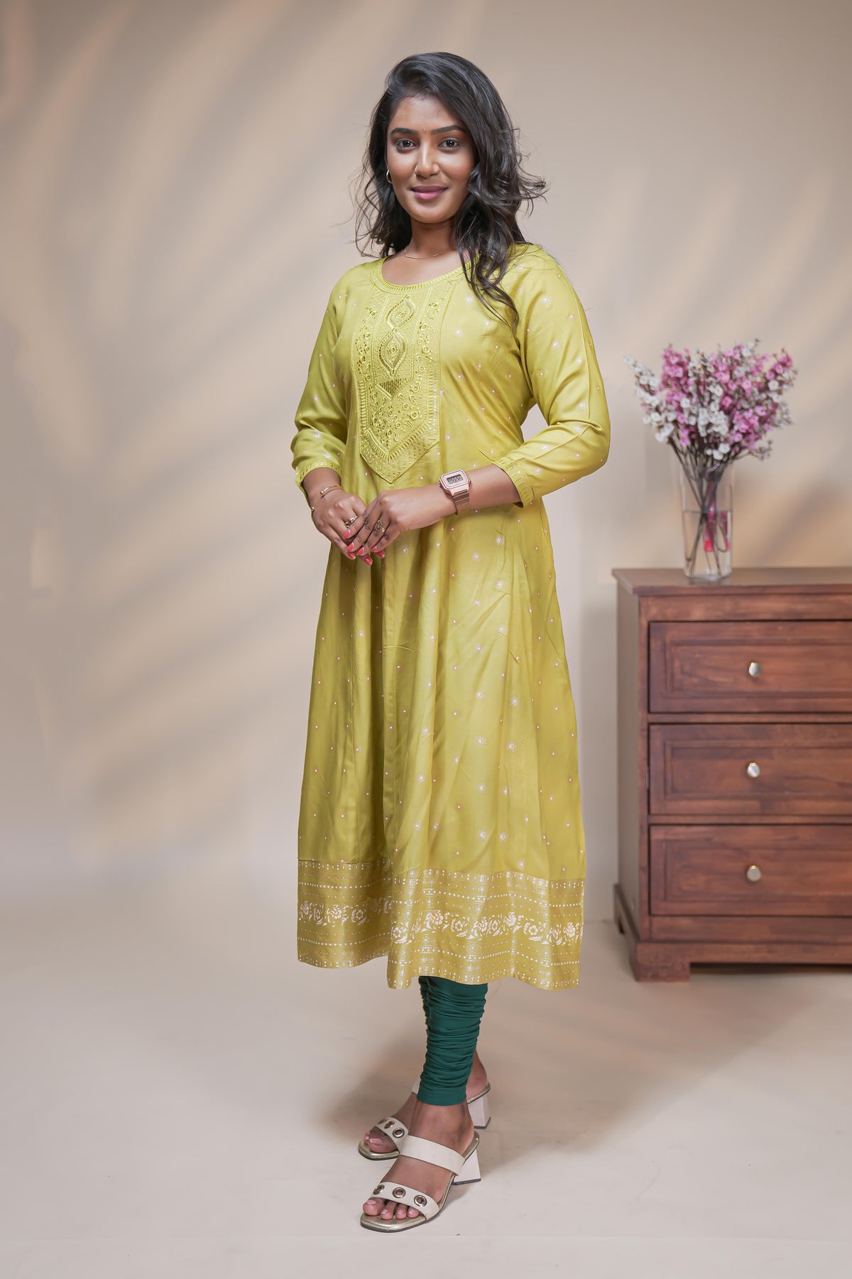 Lime green straight anarkali kurti with polka design, round neck and 3/4 sleeves