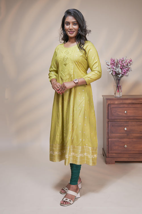 Lime green straight anarkali kurti with polka design, round neck and 3/4 sleeves