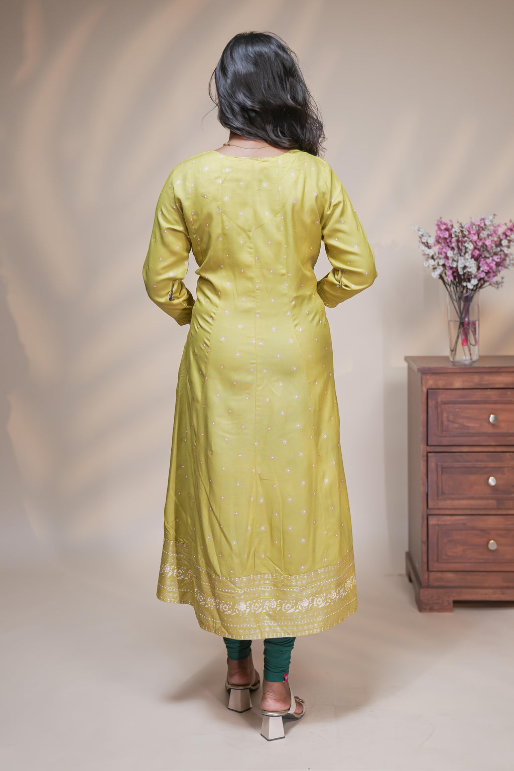 Lime green straight anarkali kurti with polka design, round neck and 3/4 sleeves