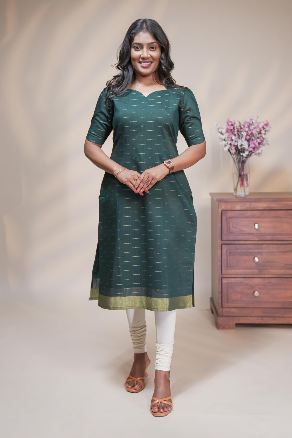 Green cotton straight kurti motifs design with half slevee and sweatheart neck