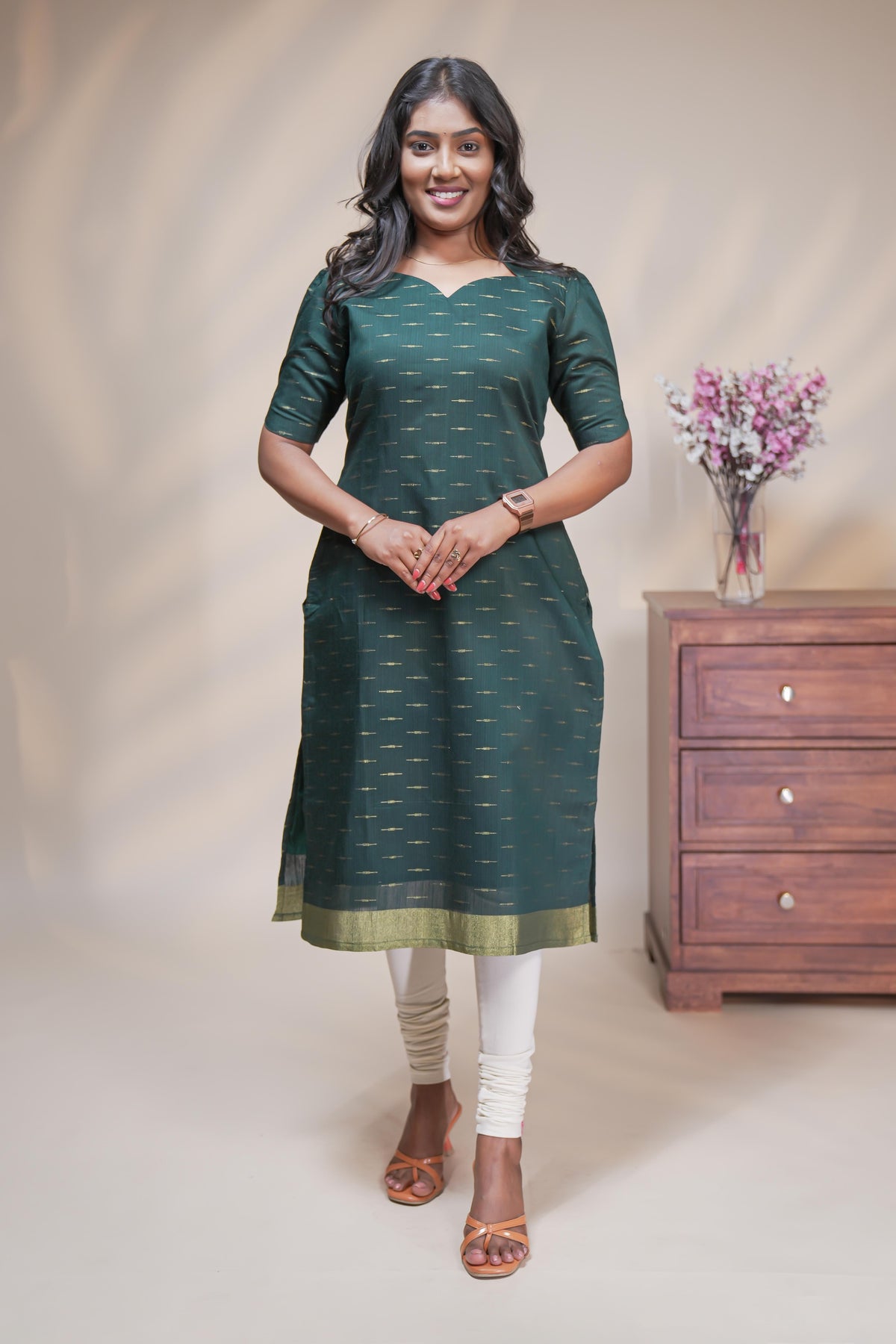 Green cotton straight kurti motifs design with half slevee and sweatheart neck