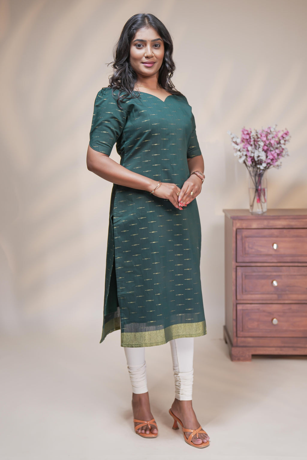 Green cotton straight kurti motifs design with half slevee and sweatheart neck