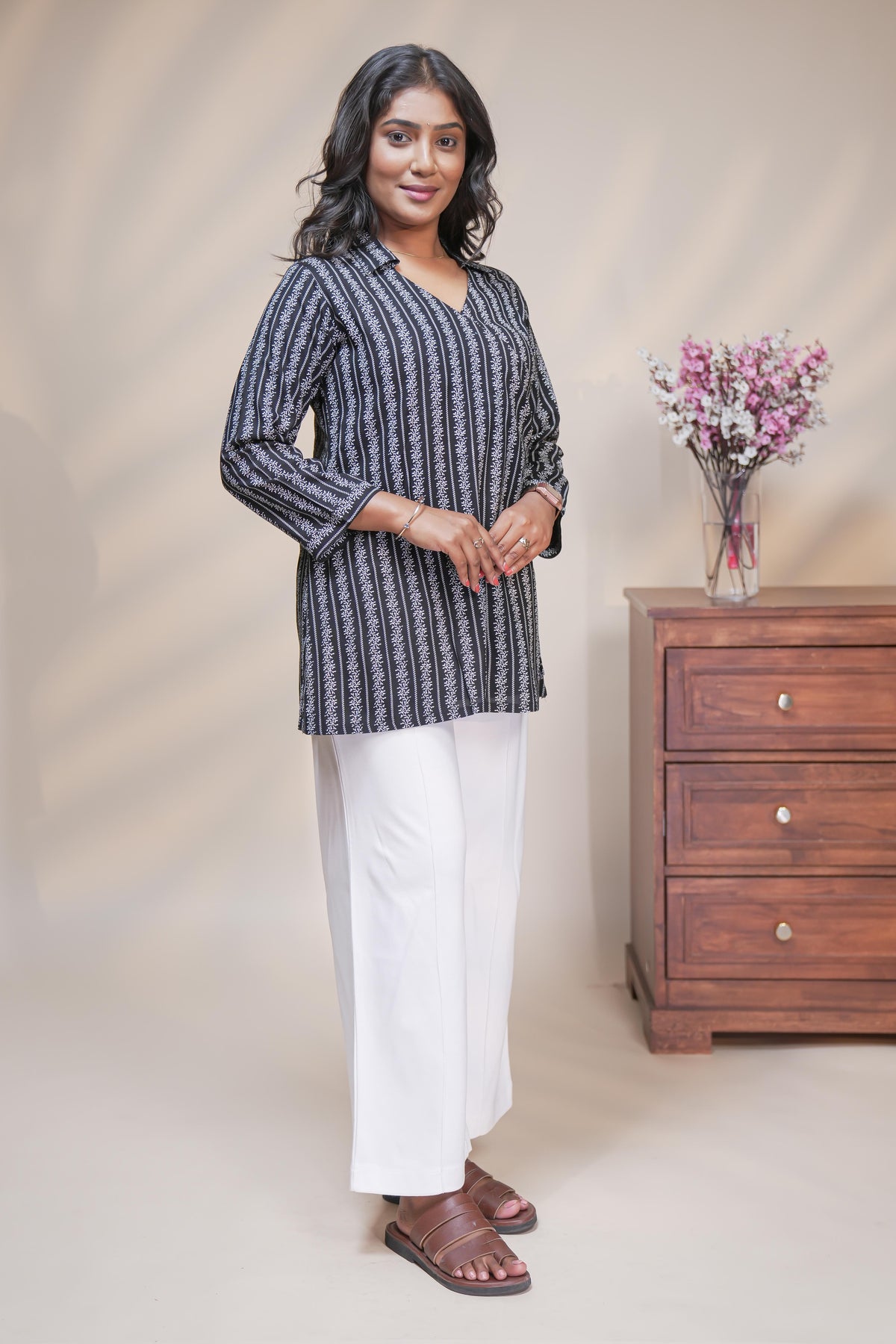 Black striped floral design short kurti with full sleeve collar neck