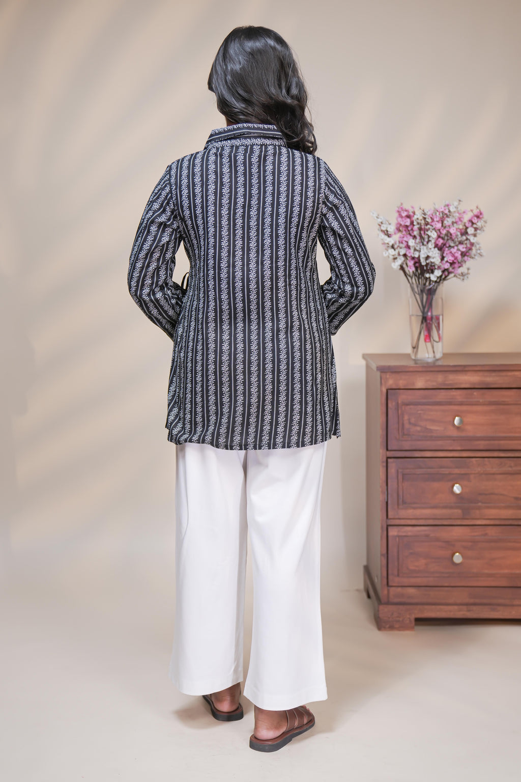 Black striped floral design short kurti with full sleeve collar neck