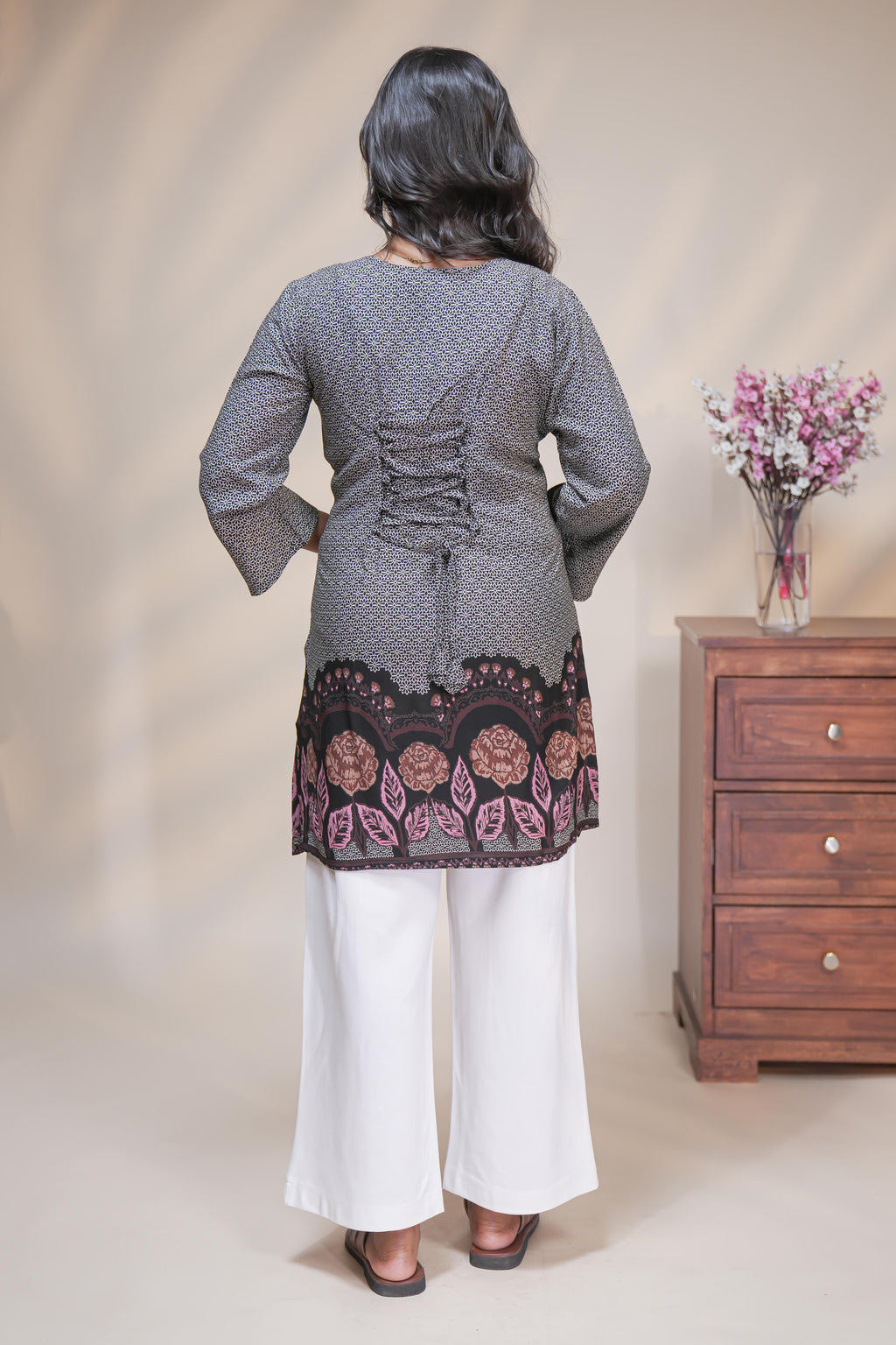 Black floral Printed Short Kurti with Notched round neckline and 3/4 sleeves