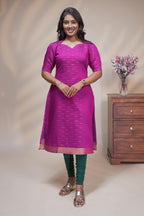 Pink cotton straight kurti motifs design with half slevee and sweatheart neck
