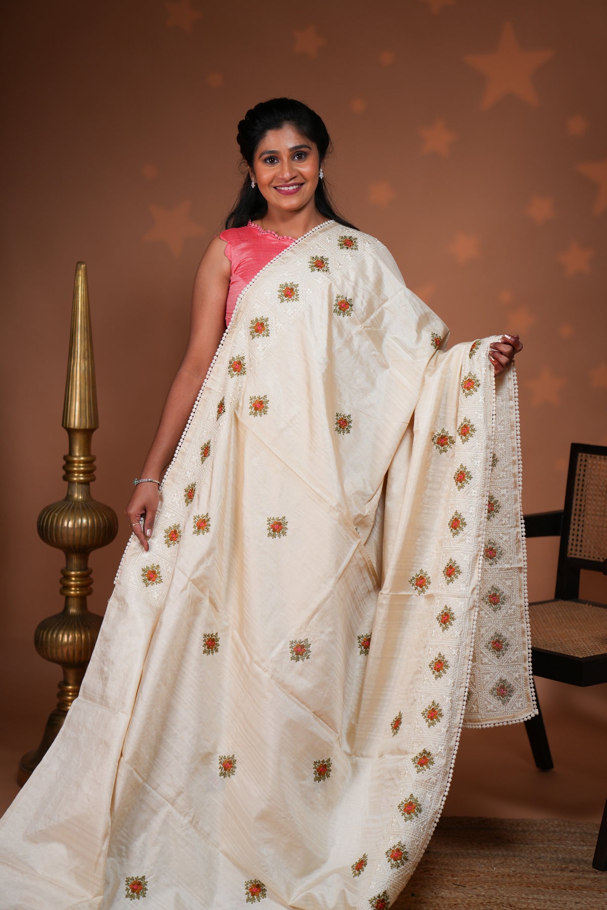 Cream embroidery floral motifs design raw silk saree with self border and matching blouse