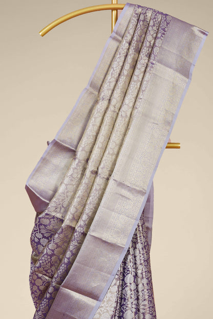 Beige silk saree with maroon border
