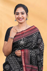 Black Dola Silk with red border