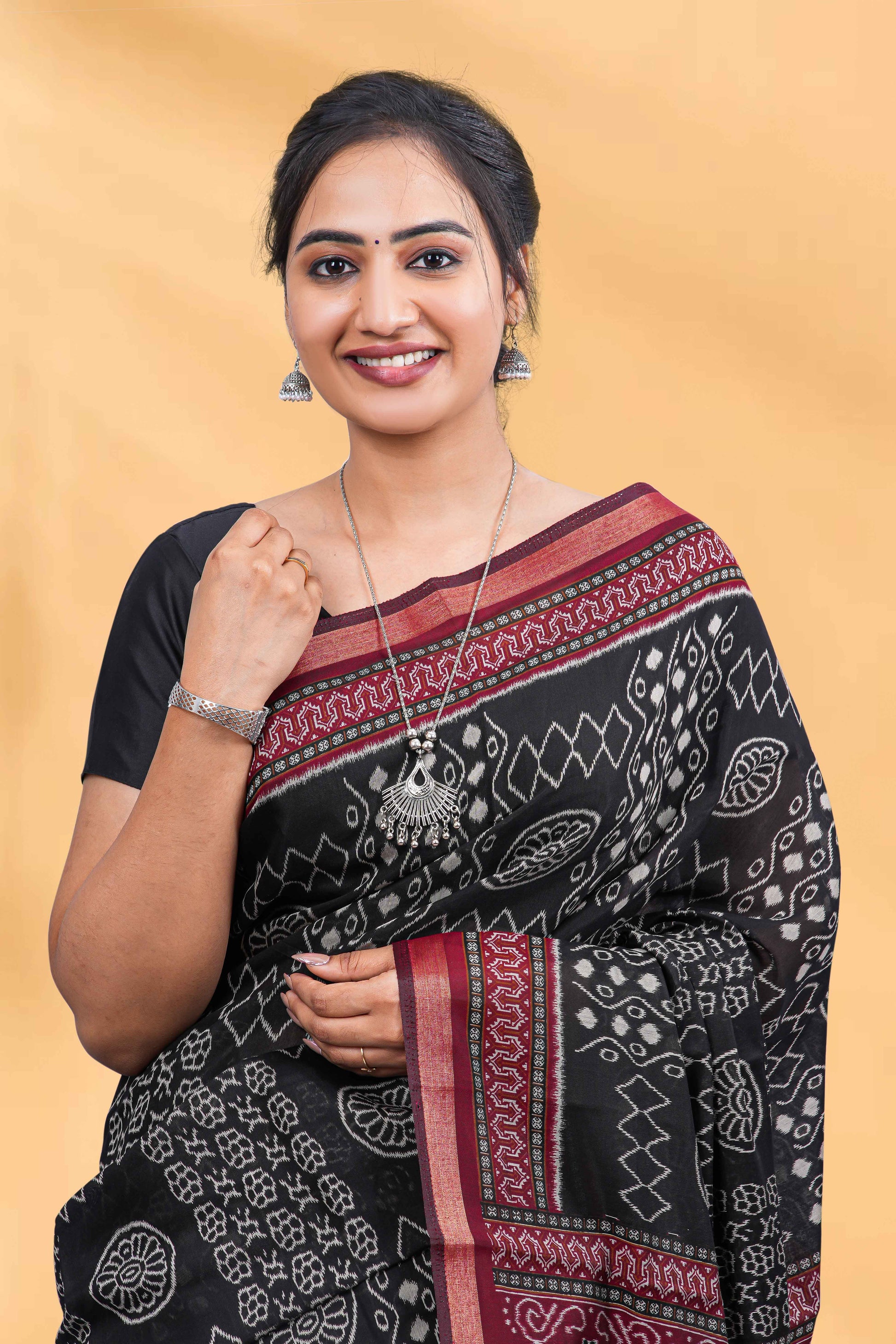 Black Dola Silk with red border