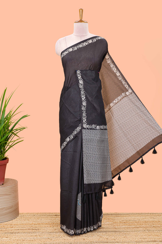 Black featuring crane bird motif print and contrast pallu Kota cotton saree