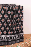 Black linen cotton saree with orange ikkat