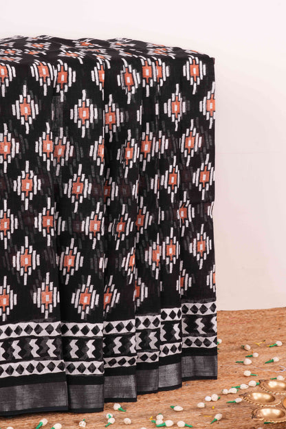 Black linen cotton saree with orange ikkat