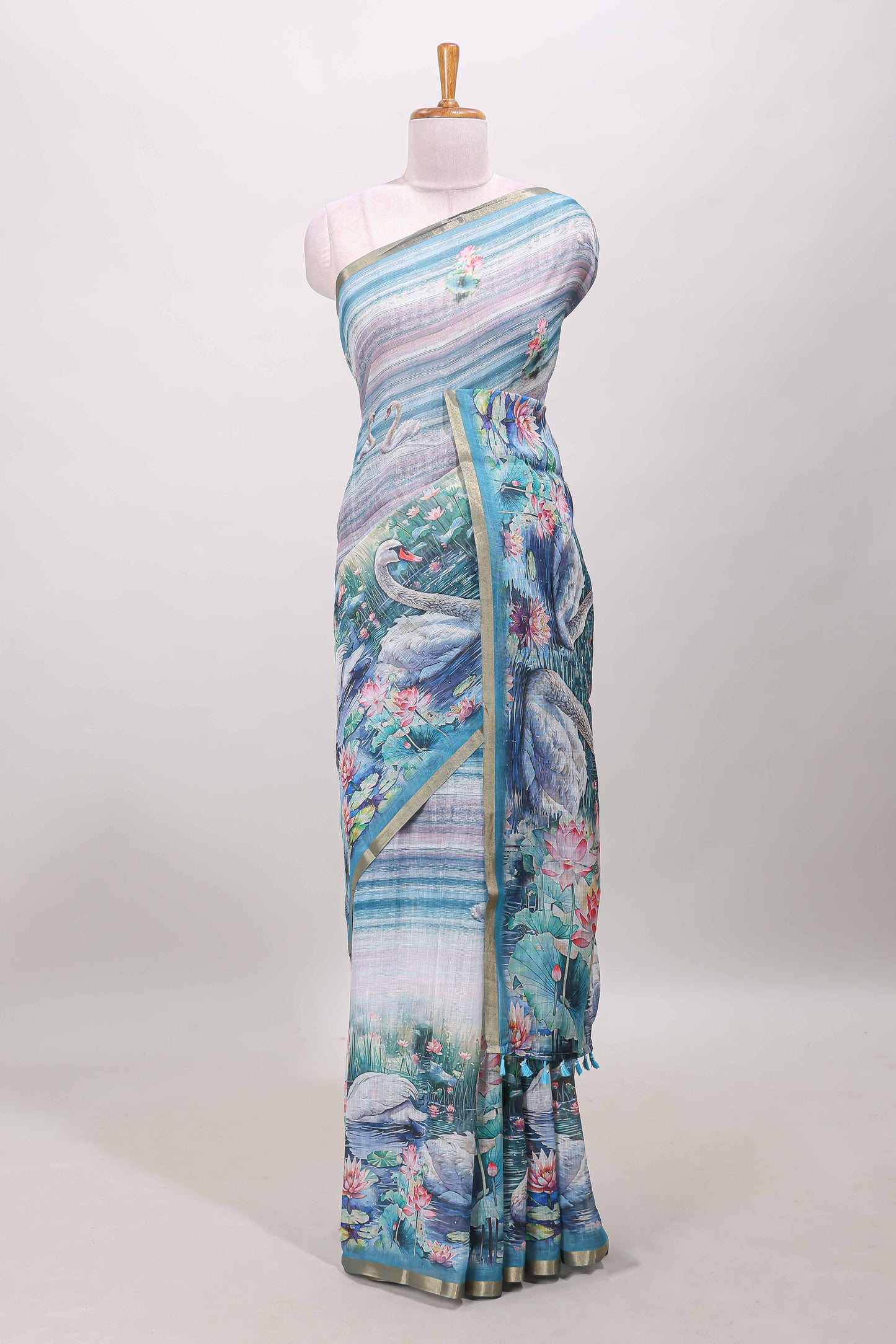 Blue linen cotton saree with swan print
