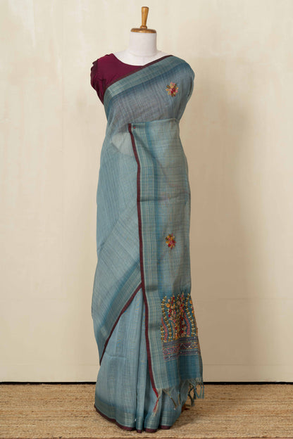 Blue linen saree with French knot work